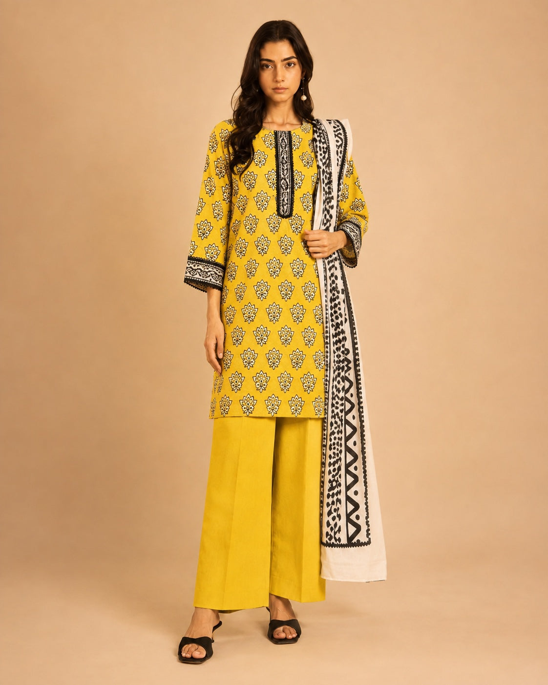 Alkaram Studio mustard and black unstitched lawn suit styled view
