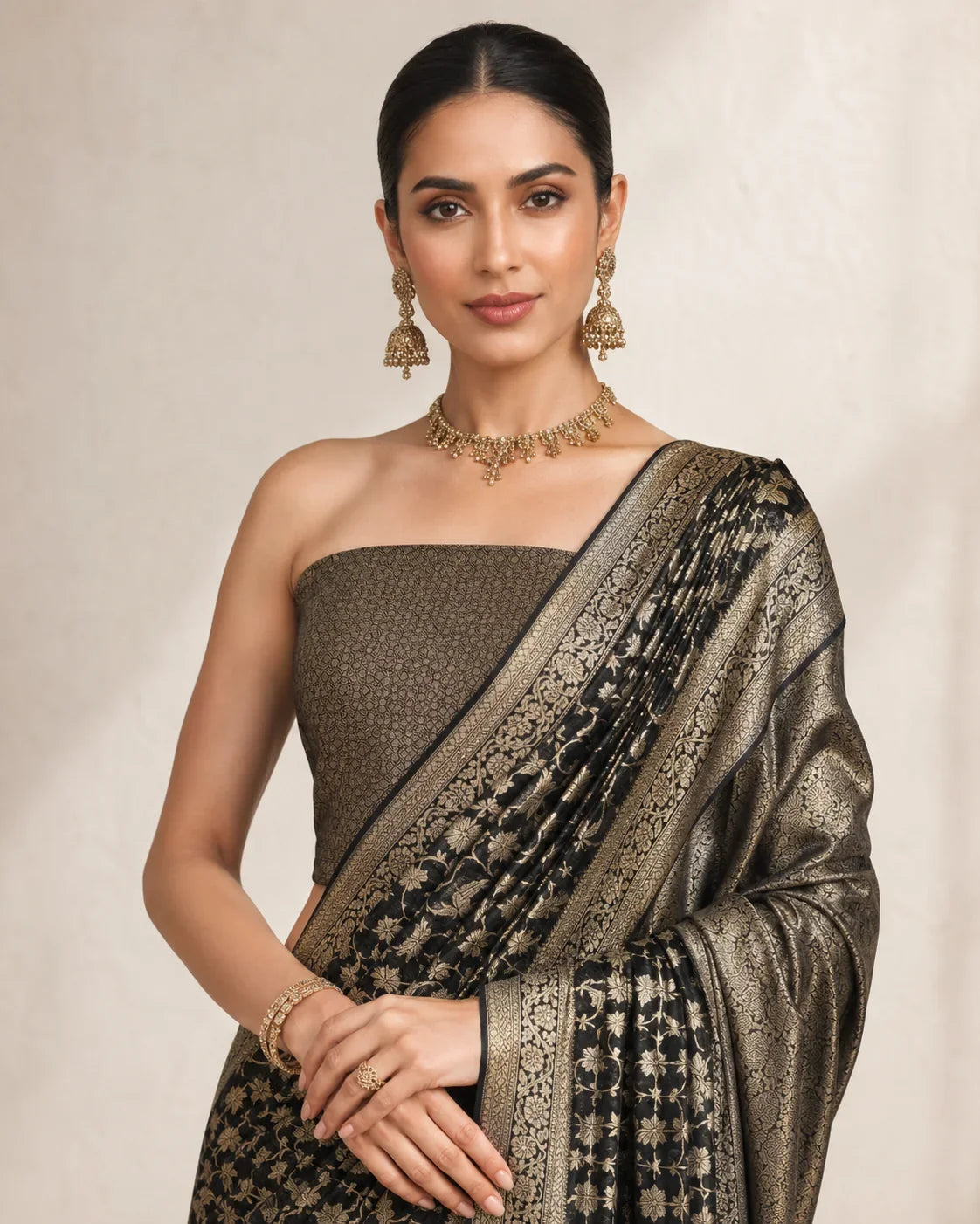 Black and antique gold Banarsi Chiffon Booti saree drape detail